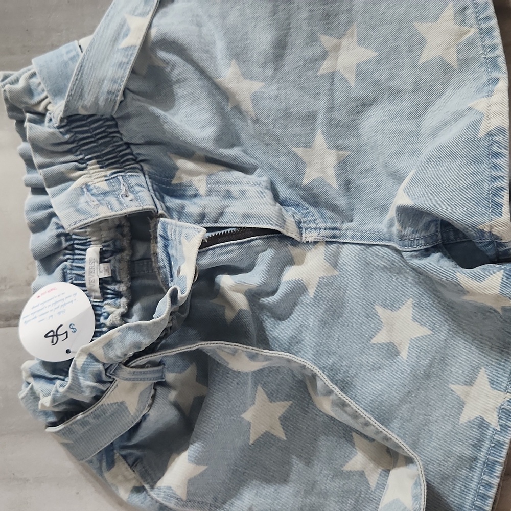 Boutique Denim with stars and Belt size small